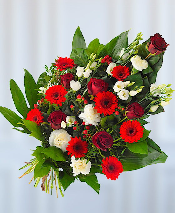 Ramo de flores en tonos rojos para funeral